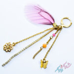 گوشواره آویزدار پروانه‌ای با بال بنفش