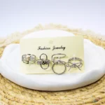 پک انگشتر 7 تایی فانتزی نقره‌ای ترند طرح ستاره، پاپیون، پیچ و بینهایت، اکسسوری شیک