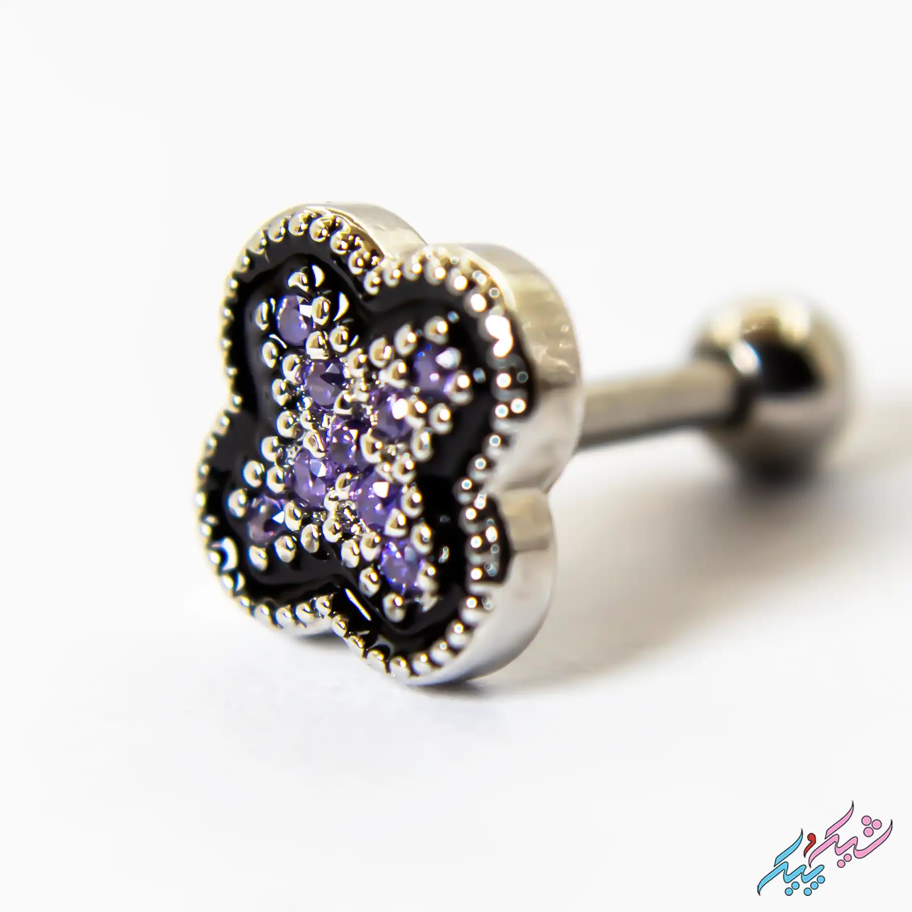 pircing-14-2webp پیرسینگ گوش میخی مدل ونکلیف نگینی (بنفش) | شیک و پیک