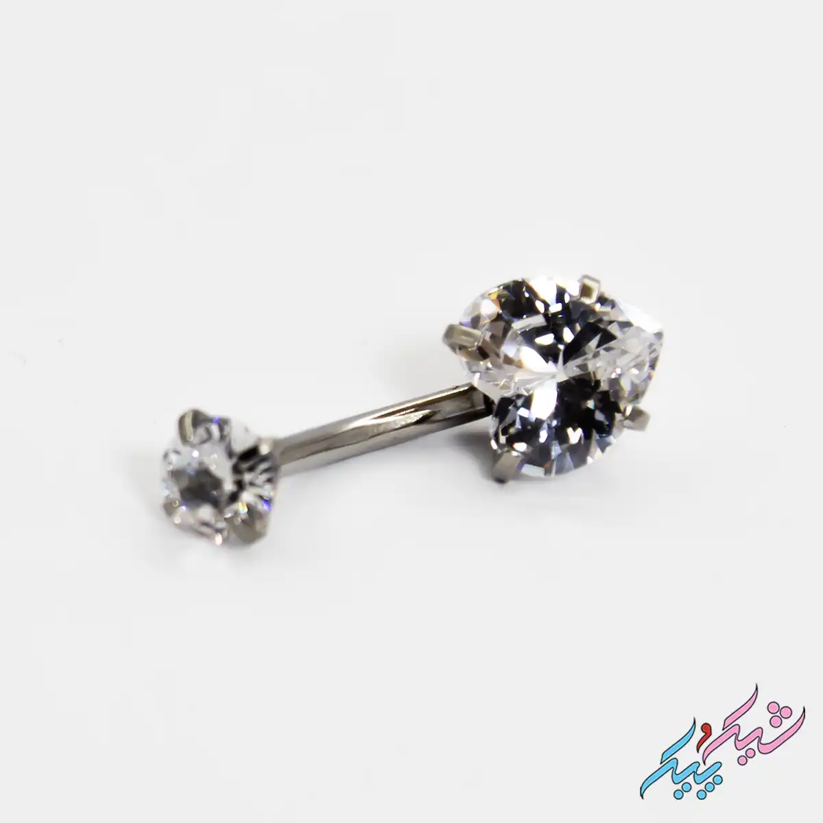 pircing-28-1 پیرسینگ ناف استیل طرح نگین قلبی | شیک و پیک